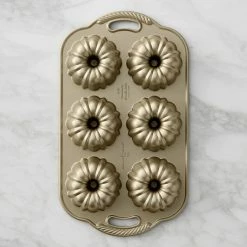 Nordic Ware Mini Bundt® Cake Pan 5 Nordic Ware Mini Bundt® Cake Pan -Cookware Shop Online nordic ware mini bundt cake pan 202240 0052 nordic ware cast aluminum nonstick mini anniversary bundt z